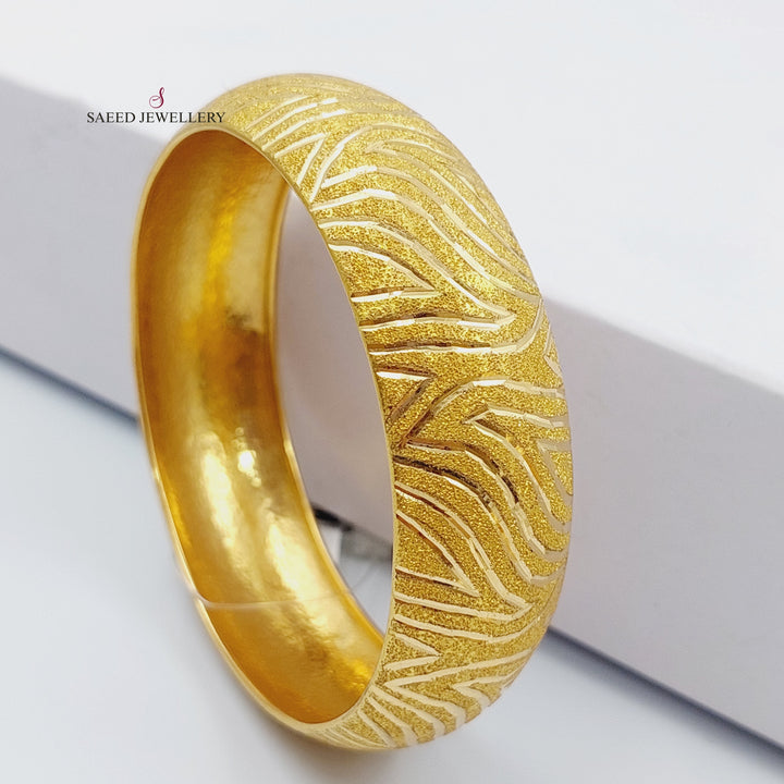 21K Gold Bold Bangle by Saeed Jewelry - Image 1