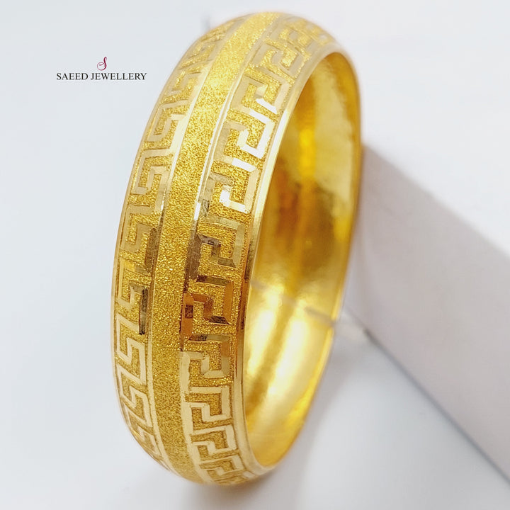 21K Gold Bold Bangle by Saeed Jewelry - Image 1