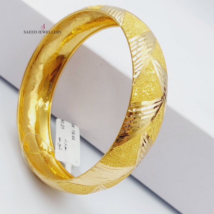 21K Gold Bold Bangle by Saeed Jewelry - Image 1