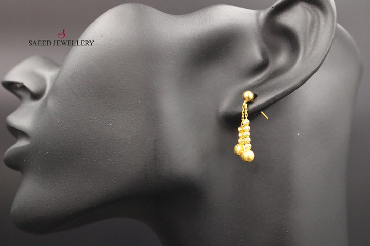 21K Gold Fancy screw Earrings by Saeed Jewelry - Image 2