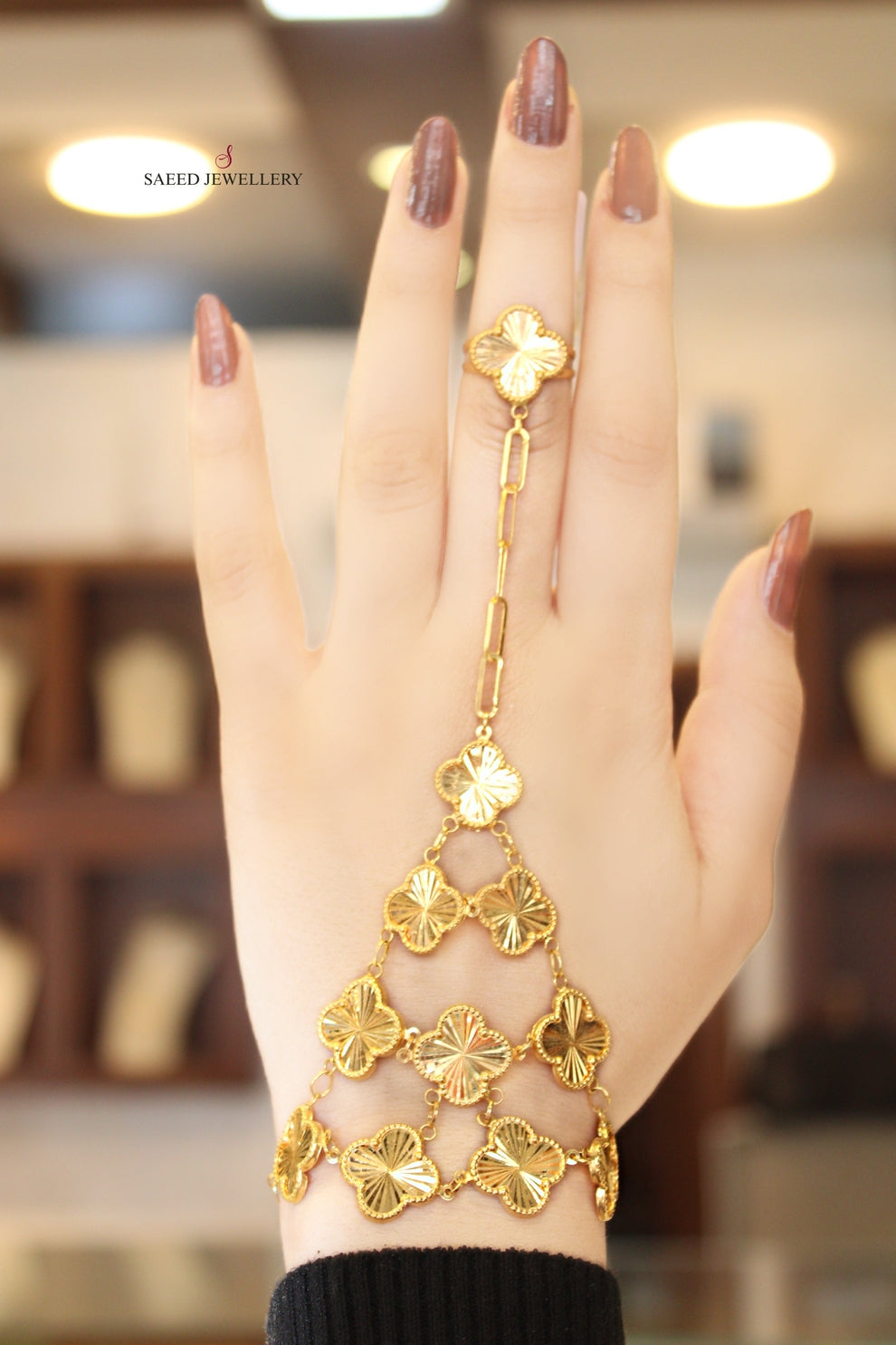 21K Gold Clover Hand Bracelet by Saeed Jewelry - Image 1