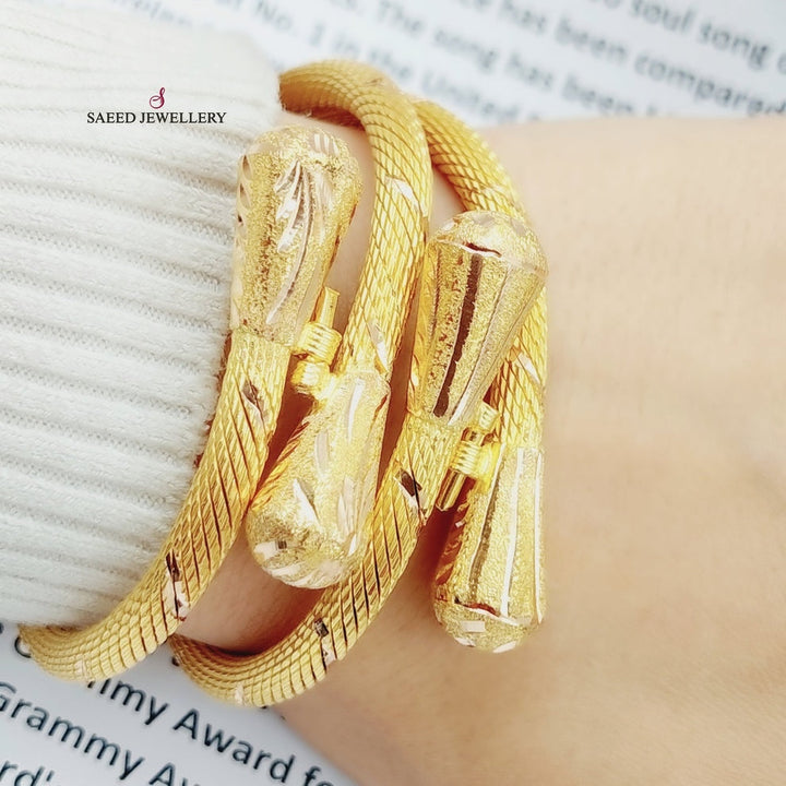 21K Gold Twisted Bangle Bracelet by Saeed Jewelry - Image 2