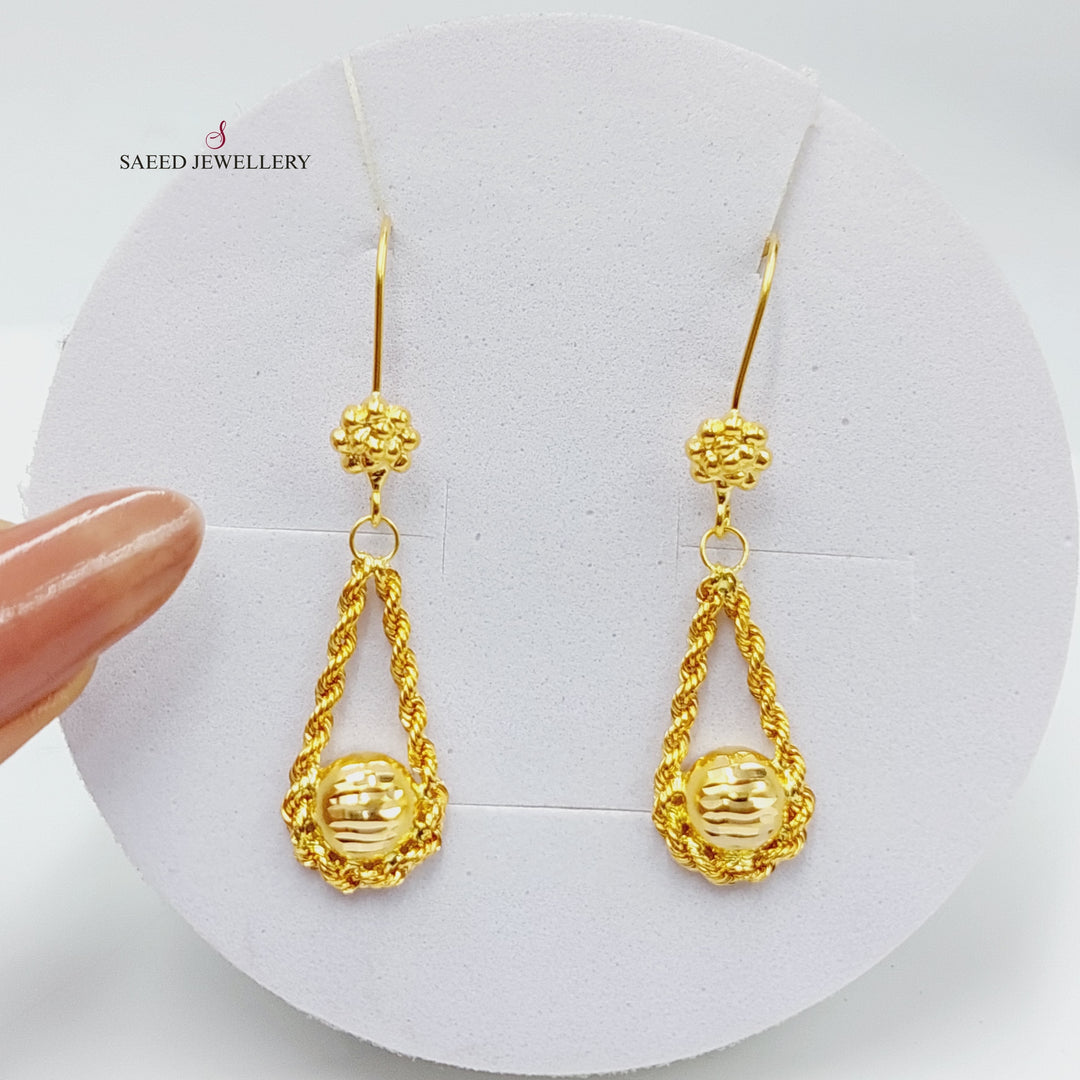 21K Gold Twisted Earrings by Saeed Jewelry - Image 1