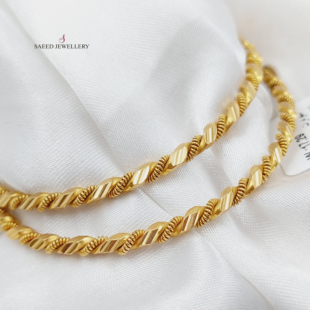 21K Gold Twisted Solid Bangle by Saeed Jewelry - Image 3