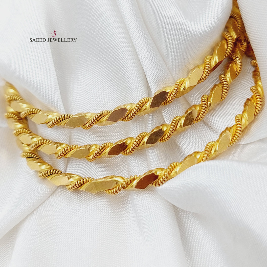 21K Gold Twisted Solid Bangle by Saeed Jewelry - Image 3