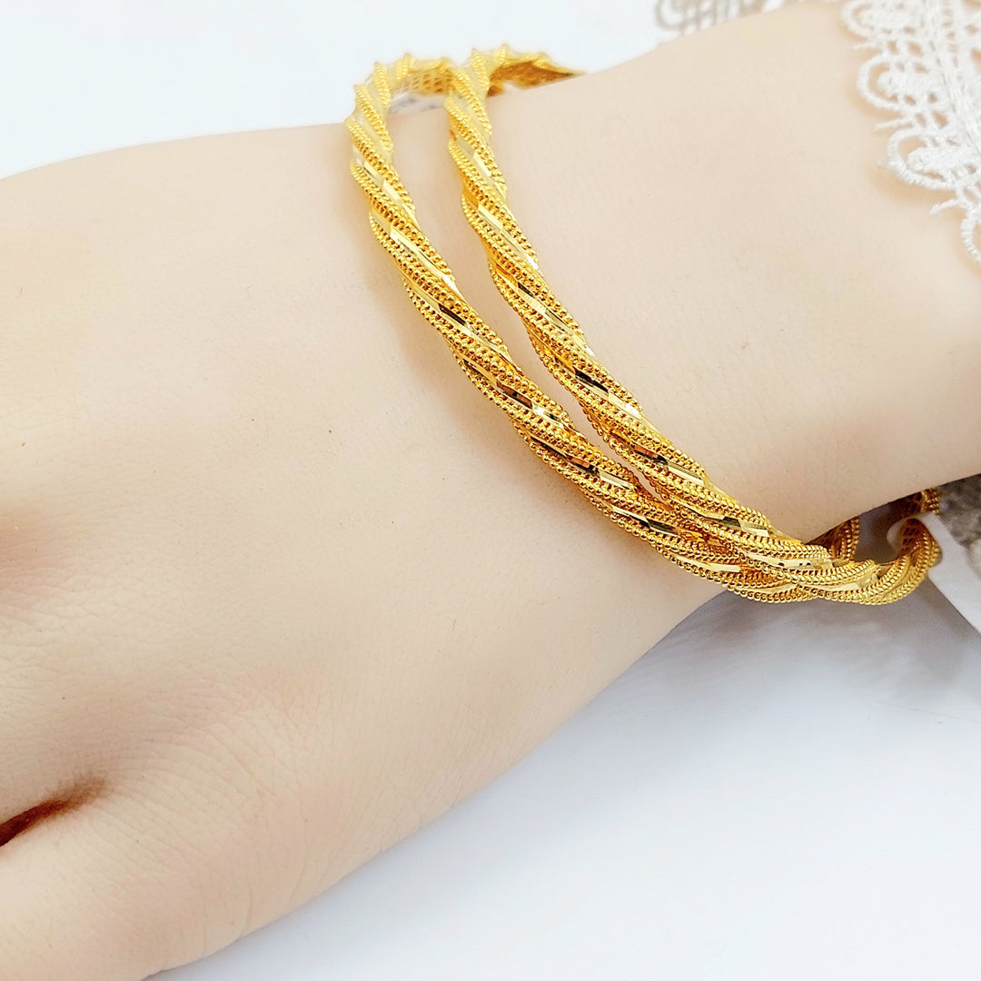 Deluxe Twisted Bangle Made of 21K Gold by Saeed Jewelry 