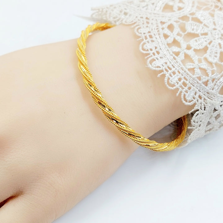 Deluxe Twisted Bangle Made of 21K Gold by Saeed Jewelry 