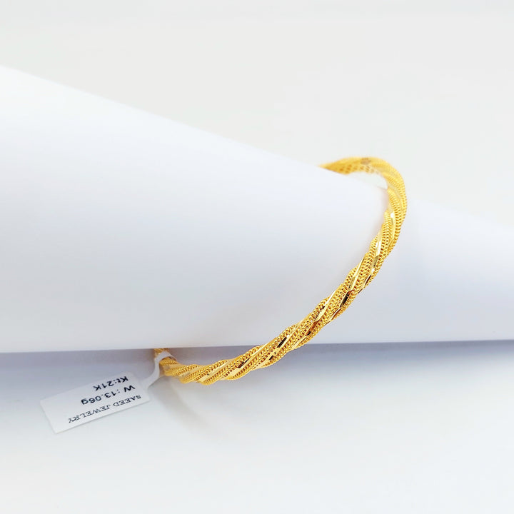 Deluxe Twisted Bangle Made of 21K Gold by Saeed Jewelry 