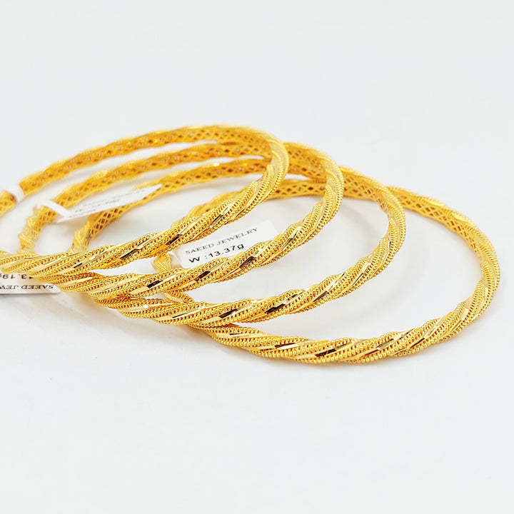 Deluxe Twisted Bangle Made of 21K Gold by Saeed Jewelry 