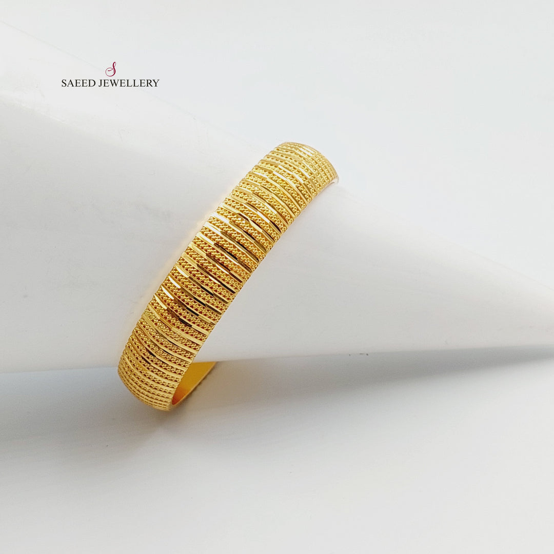 Wide Engraved Bangle Made of 21K Gold by Saeed Jewelry 