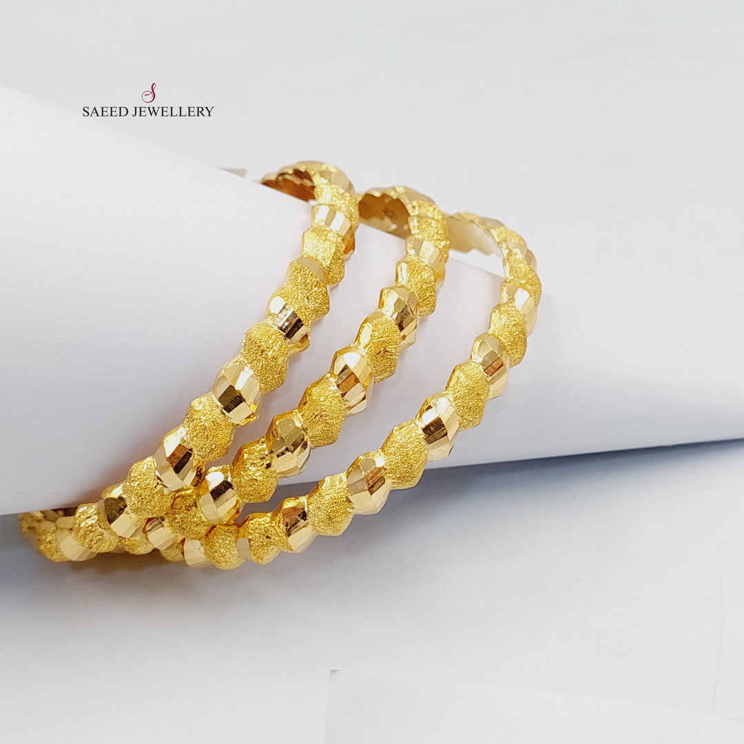 21K Gold Sanded Twisted Bangle by Saeed Jewelry - Image 4