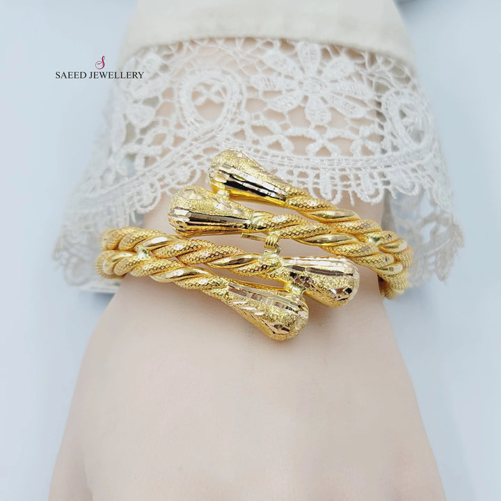 Engraved Twisted Bracelet Made of 21K Gold by Saeed Jewelry 