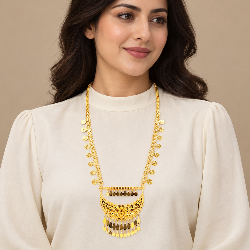 21K yellow gold long necklace with disc chains and a fringed openwork crescent pendant worn by an adult woman; AI-generated try-on simulation.
