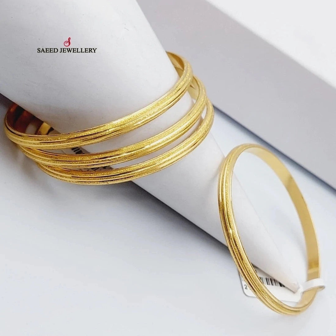 21K Gold Bold Laser Bangle by Saeed Jewelry - Image 1