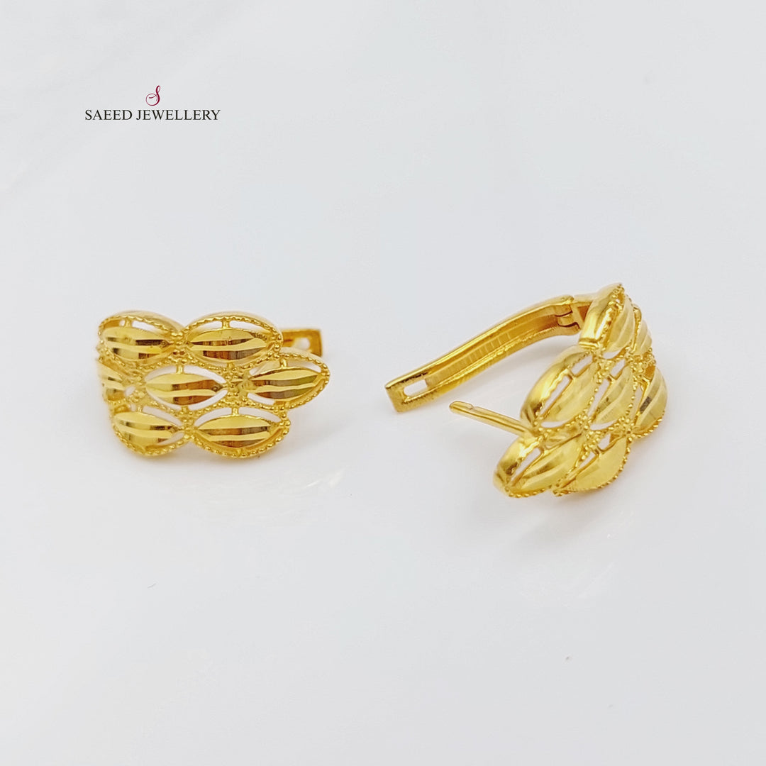 21K Gold Click Spike Earrings by Saeed Jewelry - Image 1