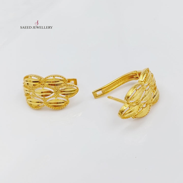 21K Gold Click Spike Earrings by Saeed Jewelry - Image 1