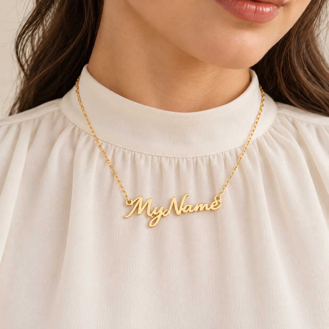 gold name necklace in English calligraphy