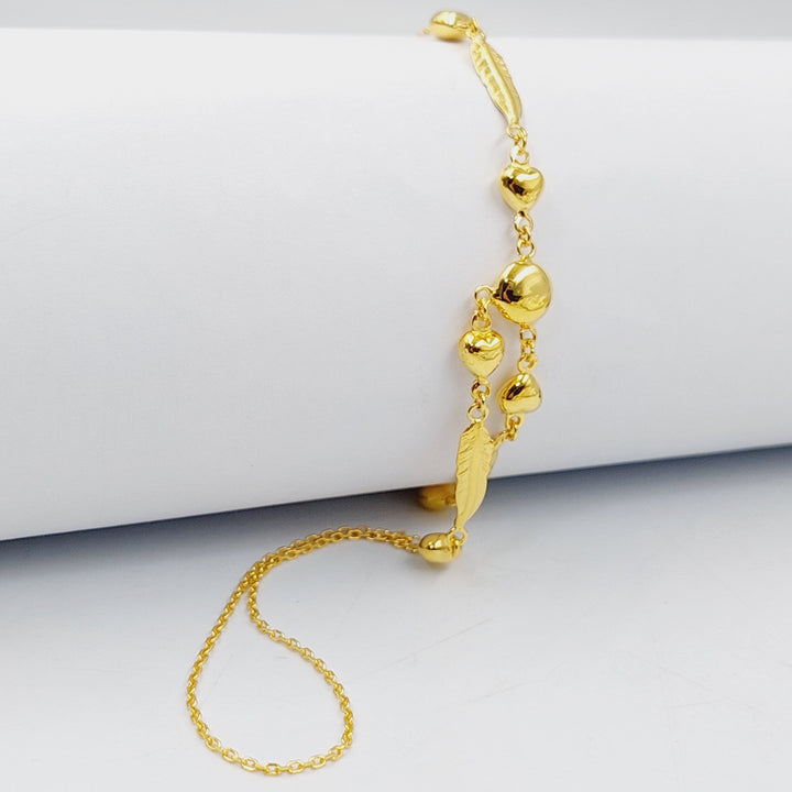 21K Gold Heart Hand Bracelet by Saeed Jewelry - Image 1