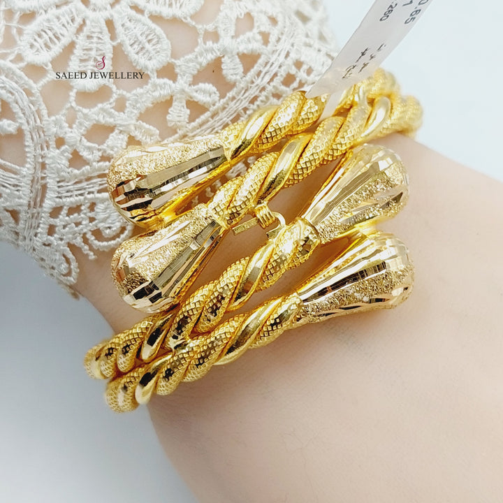 21K Gold Twisted Bangle Bracelet by Saeed Jewelry - Image 2