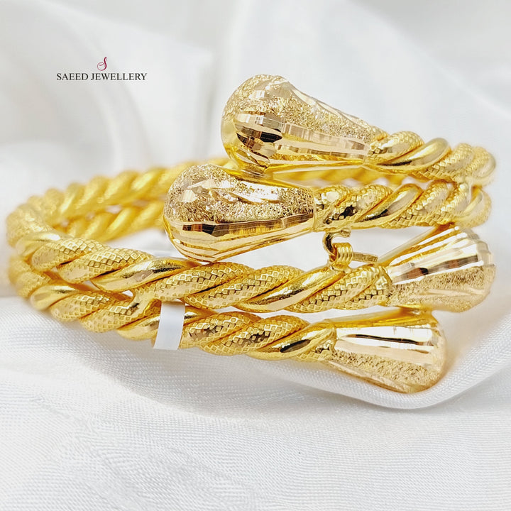 21K Gold Twisted Bangle Bracelet by Saeed Jewelry - Image 4