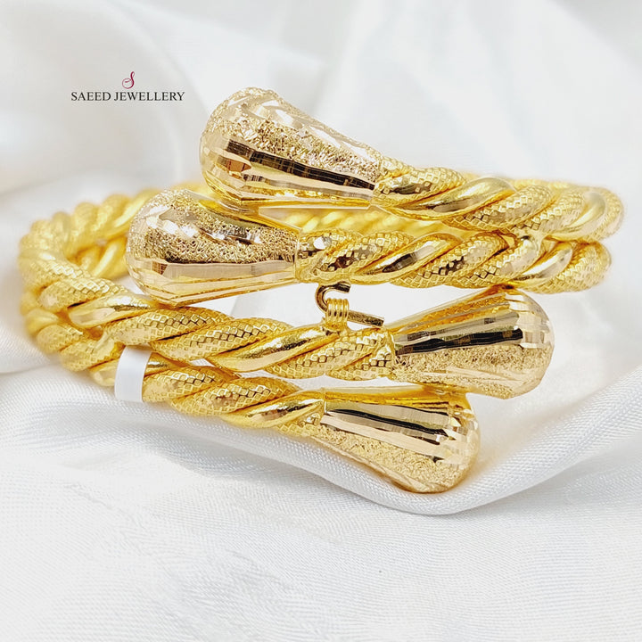 21K Gold Twisted Bangle Bracelet by Saeed Jewelry - Image 1