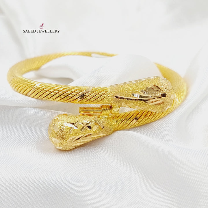 21K Gold Twisted Bangle Bracelet by Saeed Jewelry - Image 1