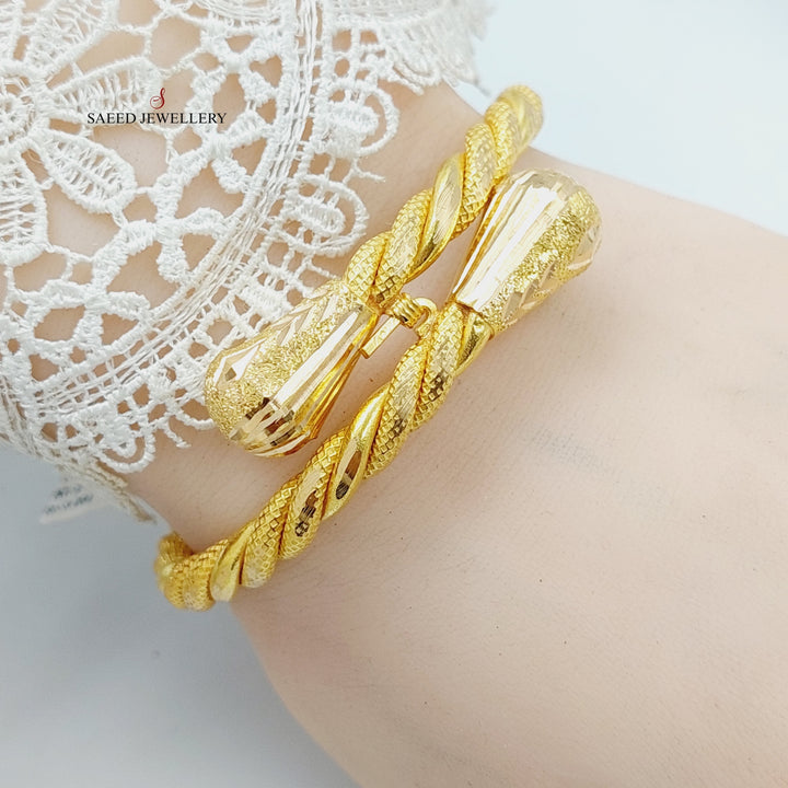 21K Gold Twisted Bangle Bracelet by Saeed Jewelry - Image 2