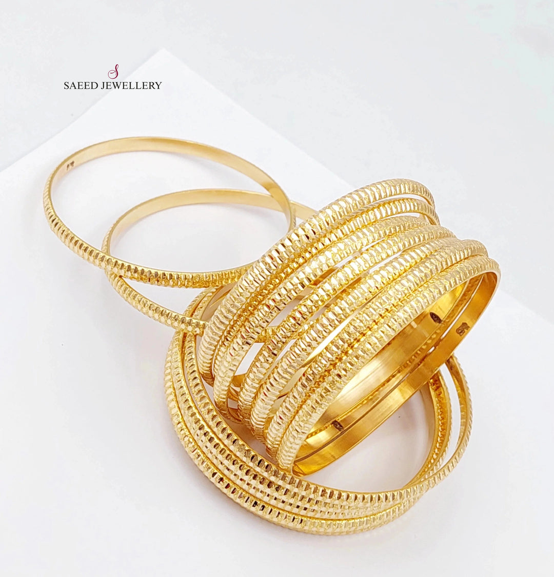 X6 Thin Laser Bangle Set Made of 21K Yellow Gold by Saeed Jewelry-thin-laser-bangle-set
